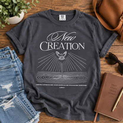 New Creation Christian t-shirt in charcoal styled with denim and Bible study accessories