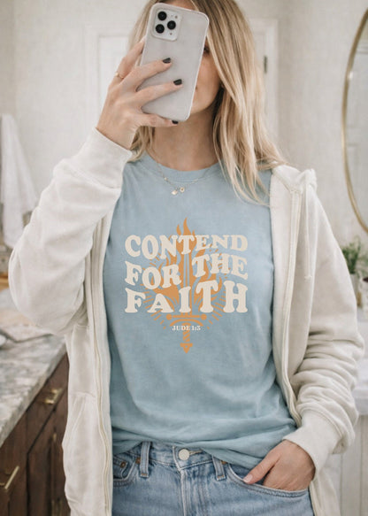 Second Born Art Contend for the Faith Flame Christian t-shirt shown on female model in agave