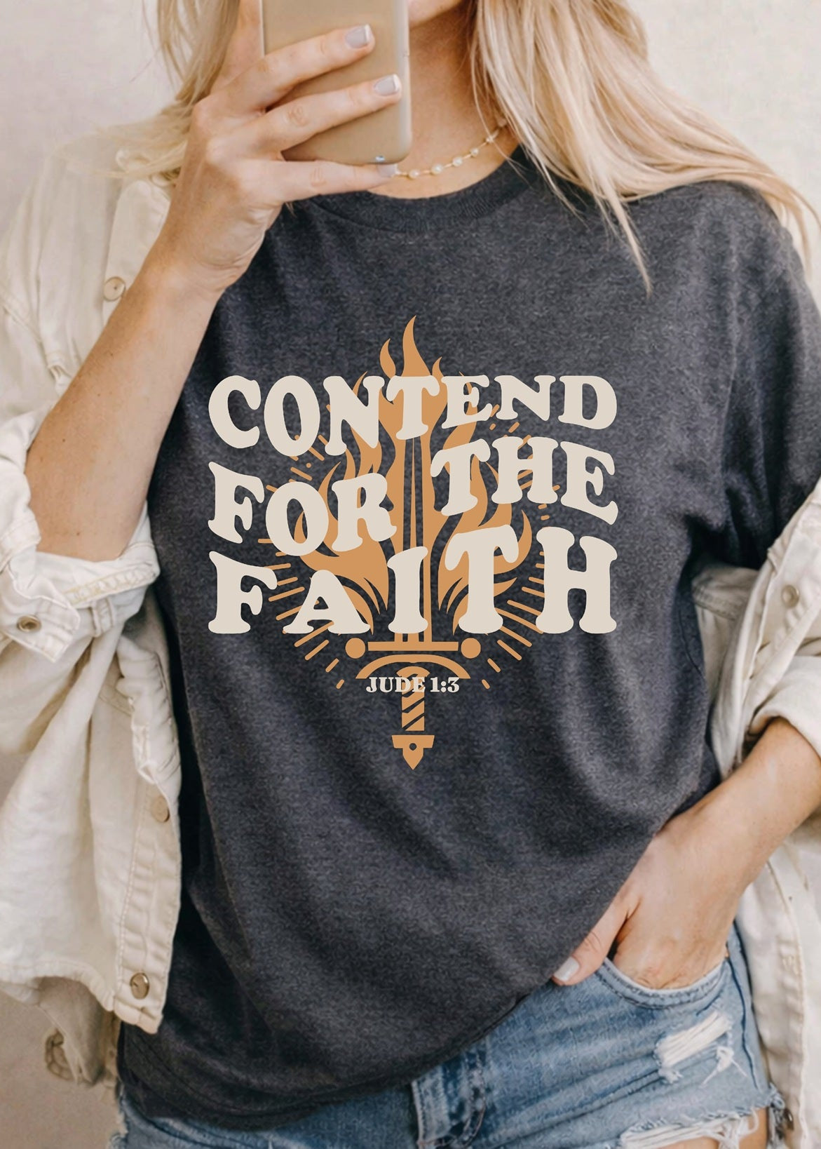 Second Born Art Contend for the Faith Flame Christian t-shirt shown on female model in charcoal heather