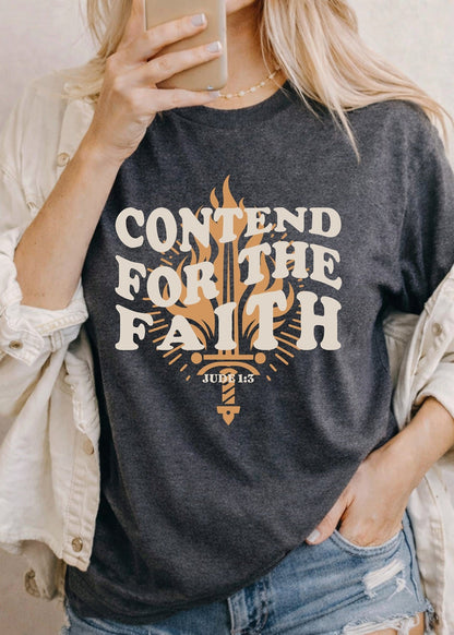 Second Born Art Contend for the Faith Flame Christian t-shirt shown on female model in charcoal heather