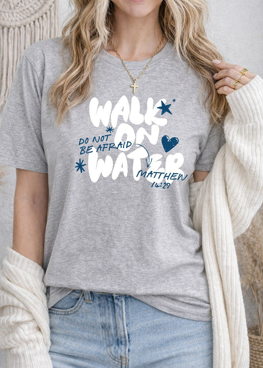 Second Born Art Walk on Water Do Not Be Afraid Christian t-shirt shown on female model in athletic heather

