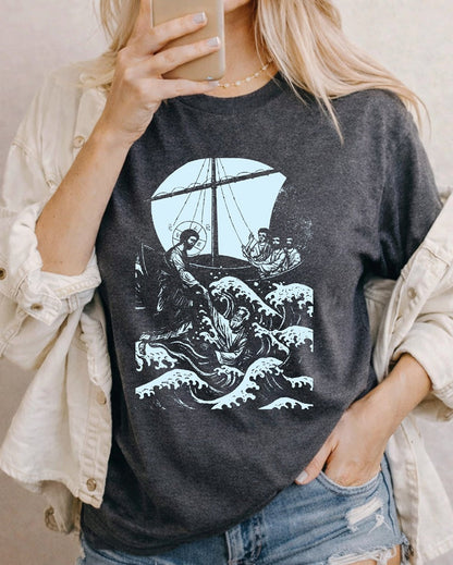 Second Born Art Walk on Water Reach Christian t-shirt shown on female model in charcoal heather